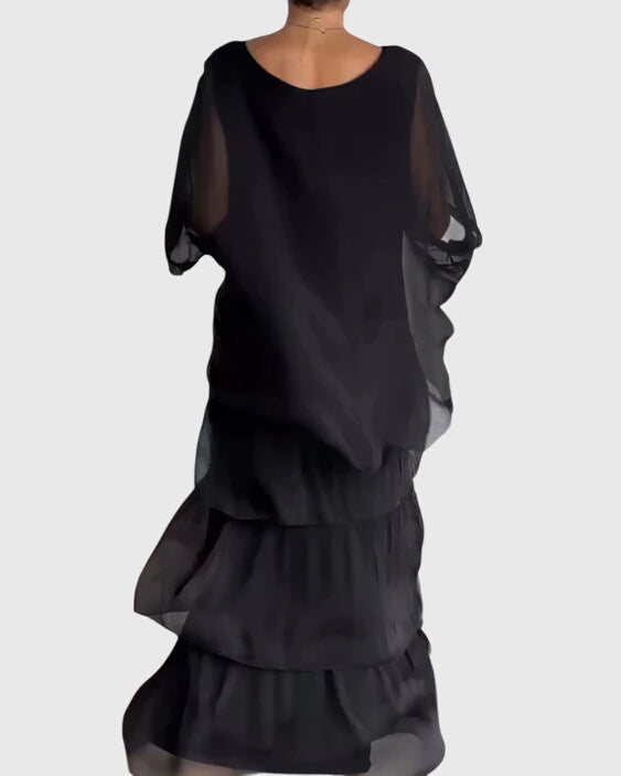 Sophisticated long formal dress for women, button-up & collared, perfect for wedding guests.