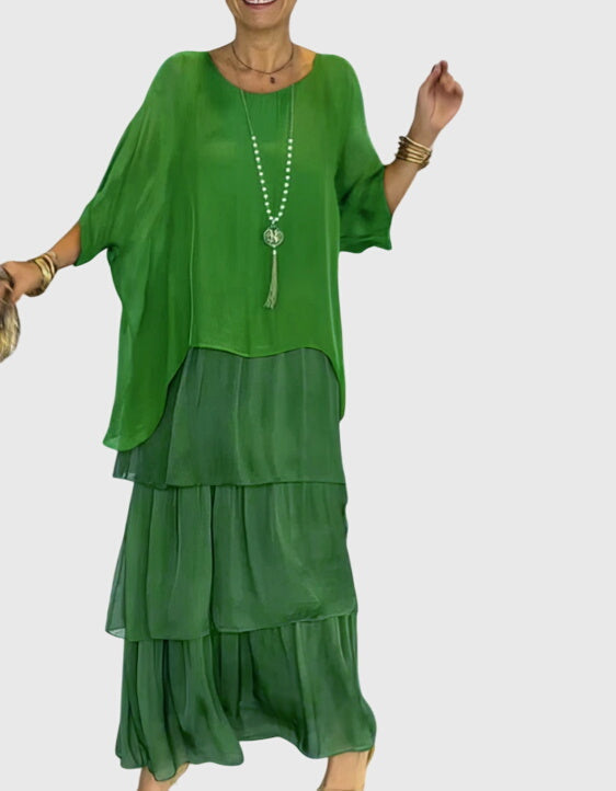 Button-up maxi dress for women, elegant flowing design, half-sleeve, suitable for formal wear.