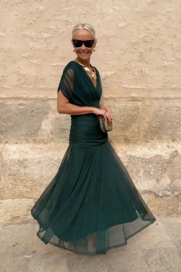 Women's fashion V-neck maxi dress, a flowing & elegant party dress for special occasion celebrations.