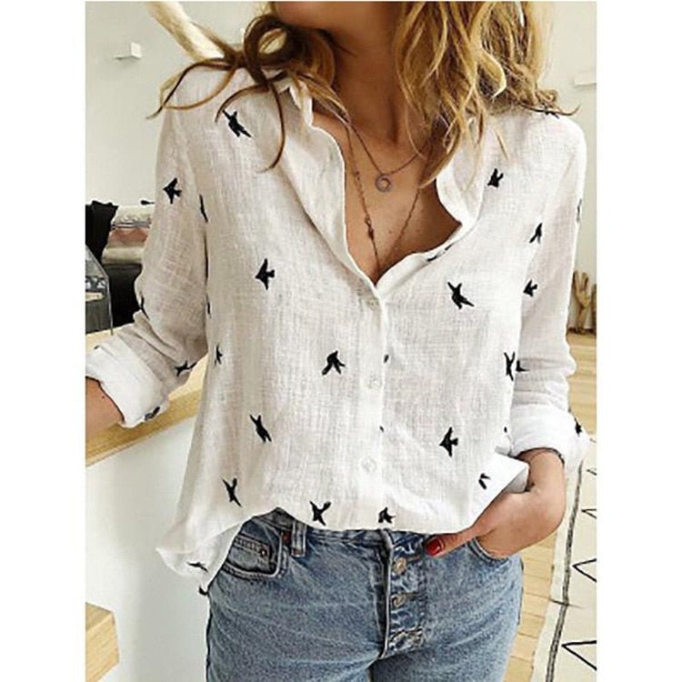 Elegant women's top, a versatile flowy blouse offering a relaxed fit for summer comfort.