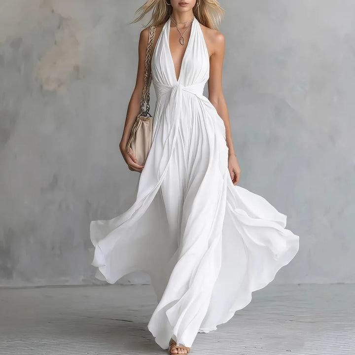 Glamorous women's backless maxi dress, flowy and pleated, ideal for special occasion parties and evening wear.