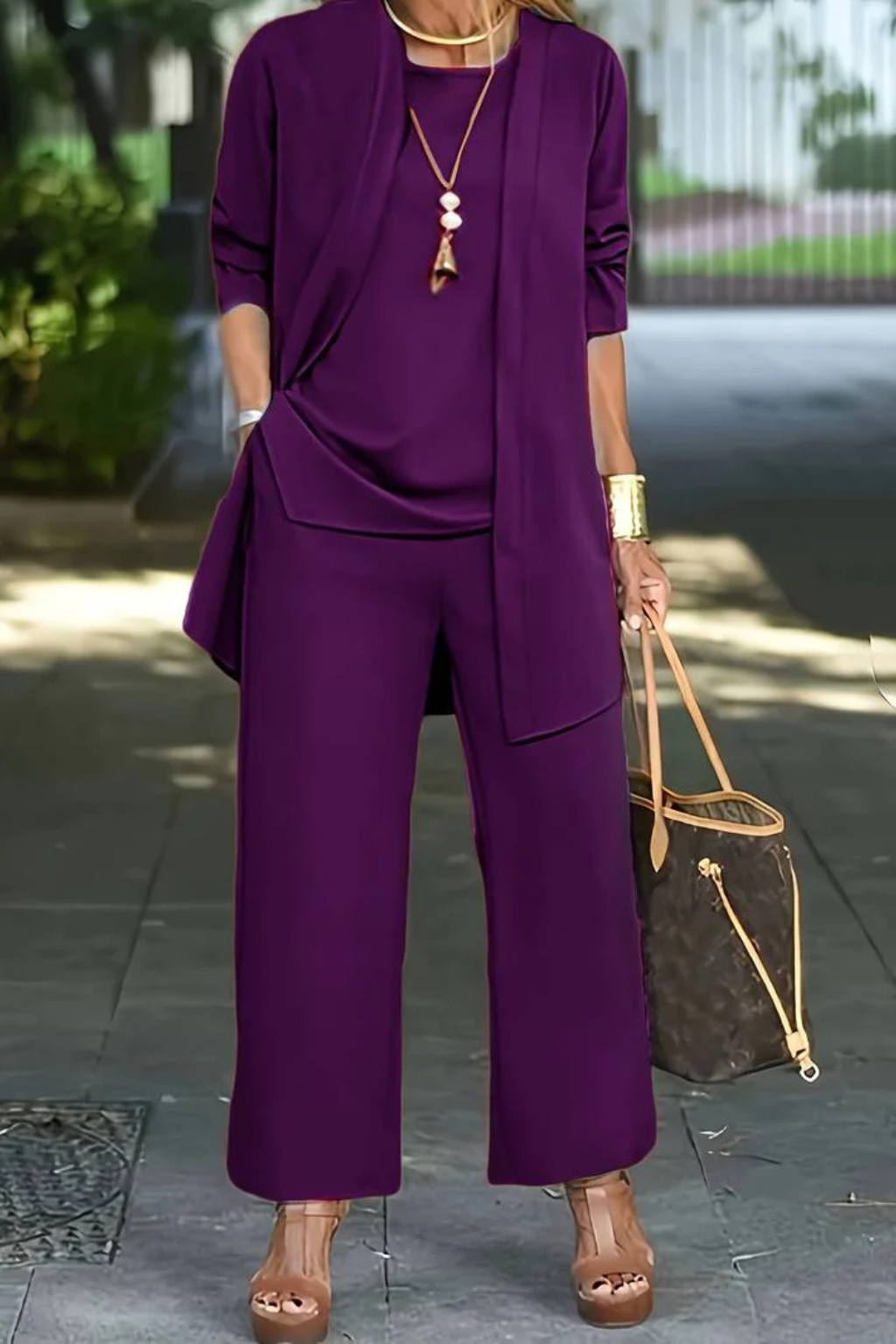 Clean lines define this elegant women's 3-piece formal set, sophisticated for any special occasion.