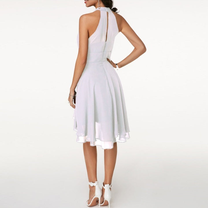 Chic halter mini dress for women, featuring an elegant fluid drape, ideal for parties & special occasions.