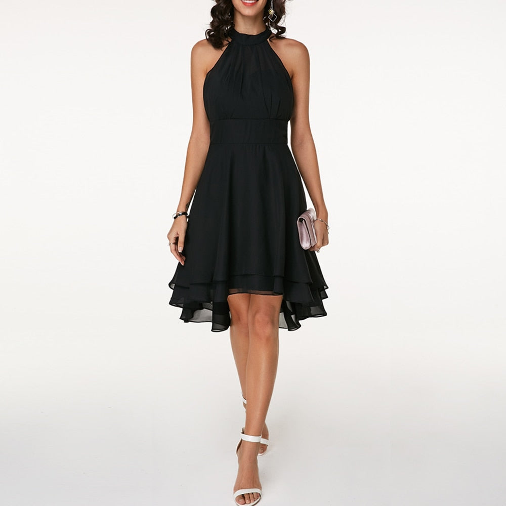 Versatile women's sleeveless halter mini dress with an elegant fluid drape, great for fashion and events.