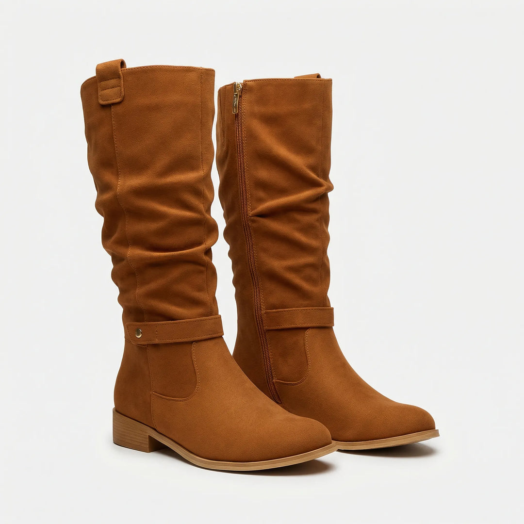 Stylish women's knee-high boots, perfect for fall fashion. Elegant design with side zipper & comfortable fit.