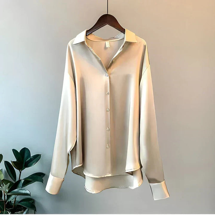 Elegant women's long sleeve blouse, perfect for versatile office wear or sophisticated casual chic style.