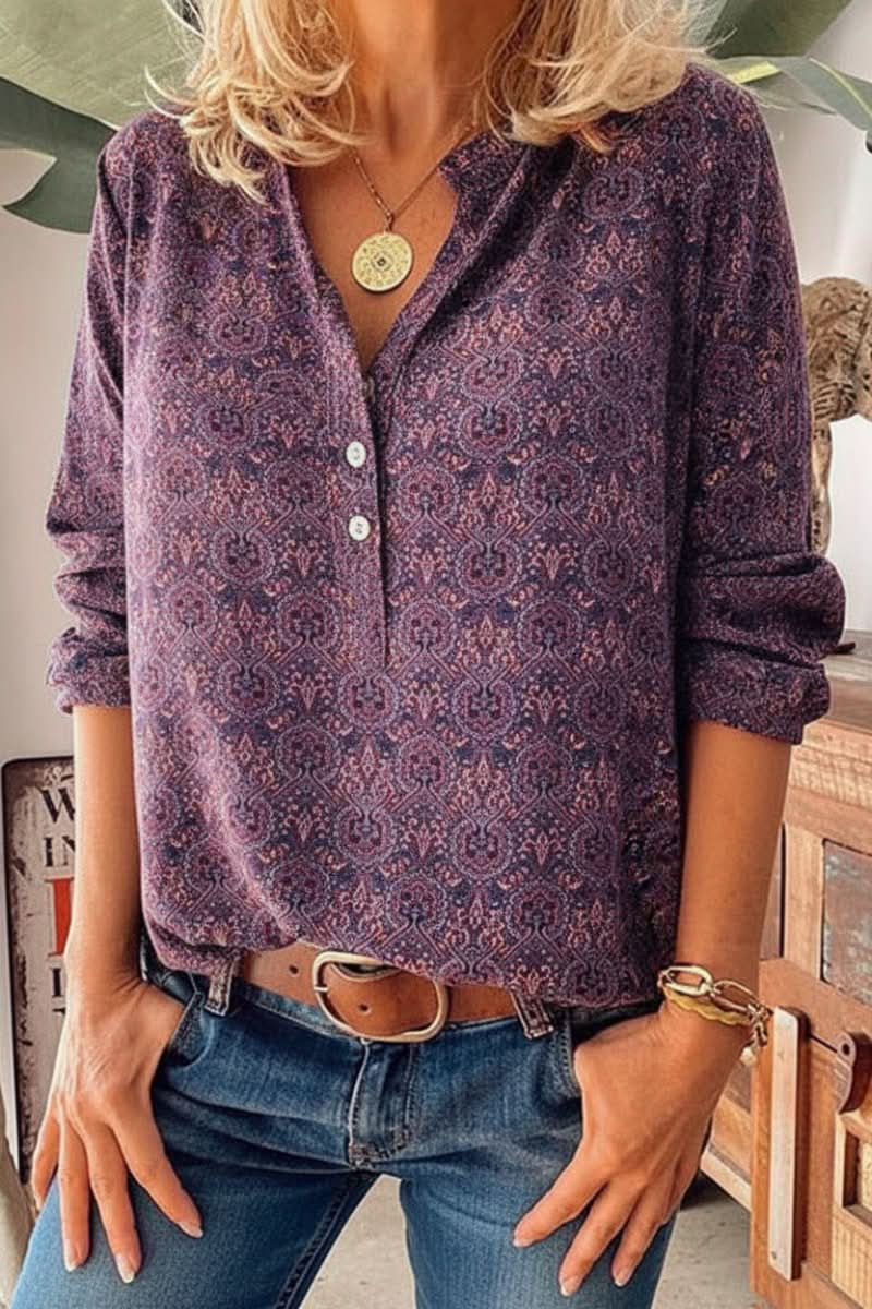 Relaxed fit women's button blouse, long sleeve. Features an elegant vintage print for versatile style.