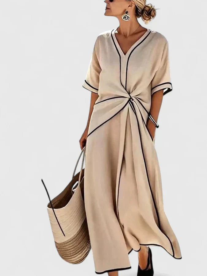 Elegant women's maxi dress with contrast trim & stylish twist front, perfect for summer vacations & casual wear.