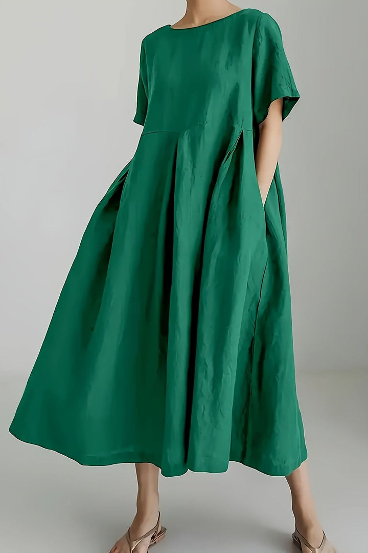 Beautiful women's elegant midi dress for sophisticated and formal occasions. A classic party dress.