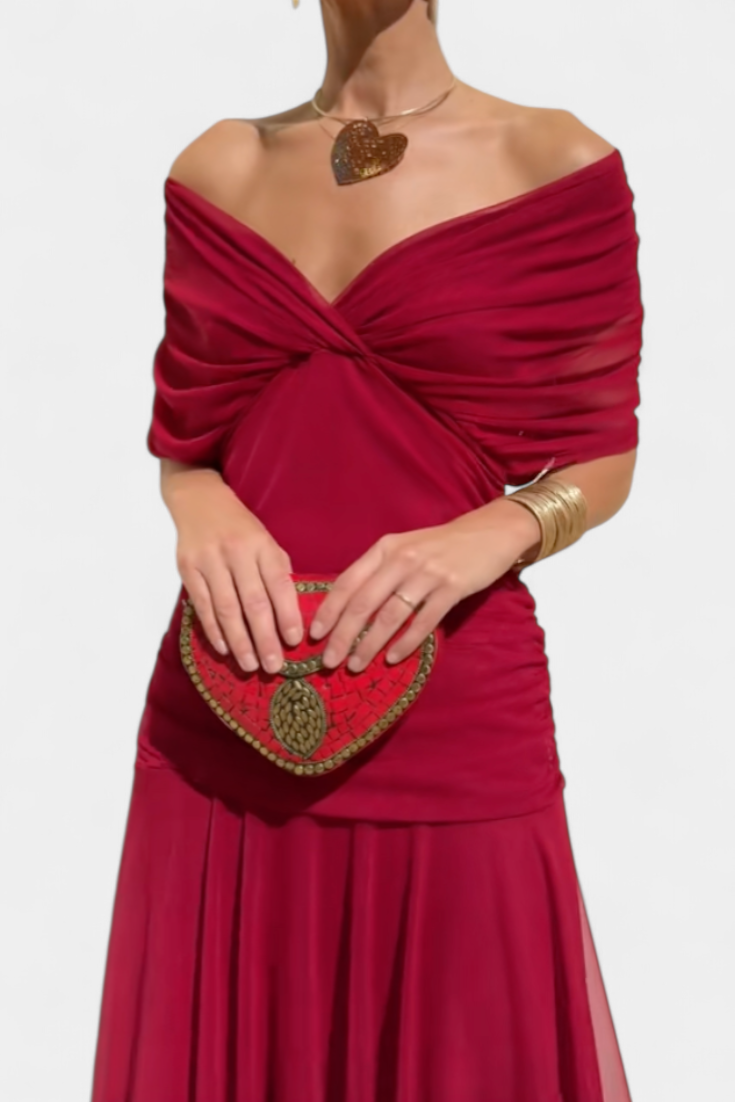 Graceful off-shoulder long dress for women, elegantly draped. Perfect as an evening gown or wedding guest attire.