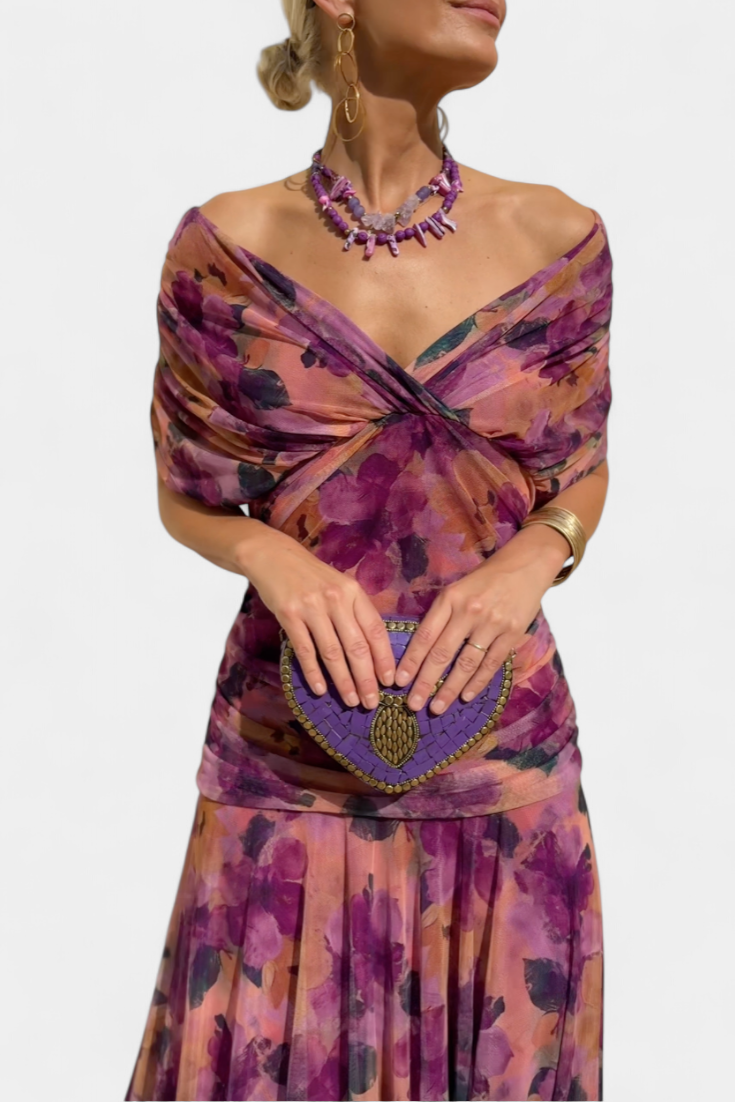 Women's elegant off-shoulder long gown, featuring beautiful draping. A perfect fit-and-flare evening dress.