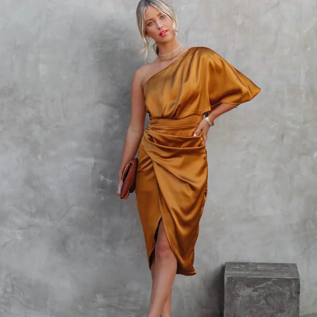Women's stylish one-shoulder ruched midi dress. A sophisticated choice for elegant evening wear and special occasions.