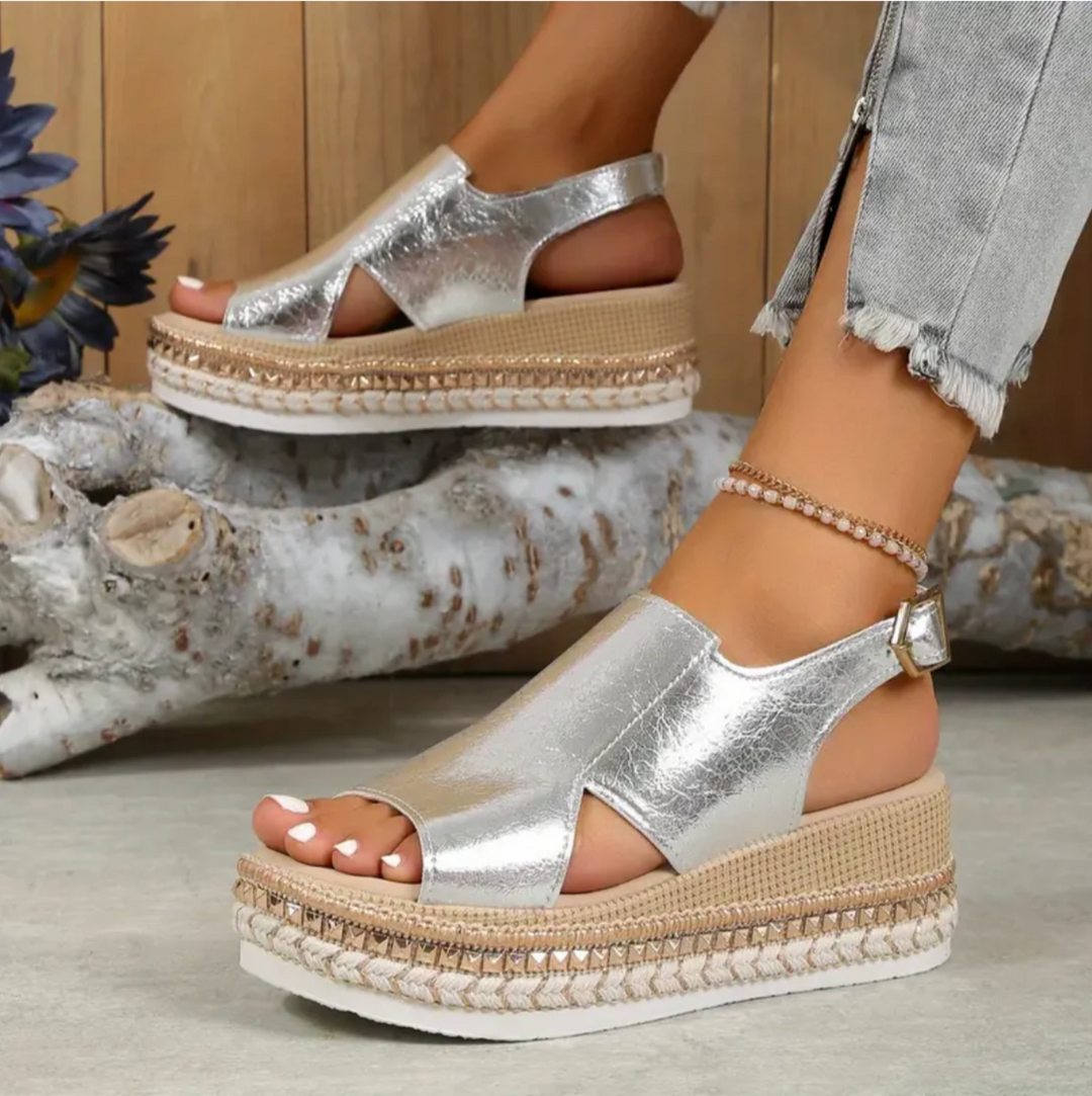 Supportive heeled orthopedic sandals for women, combining elegant design with comfortable arch support.