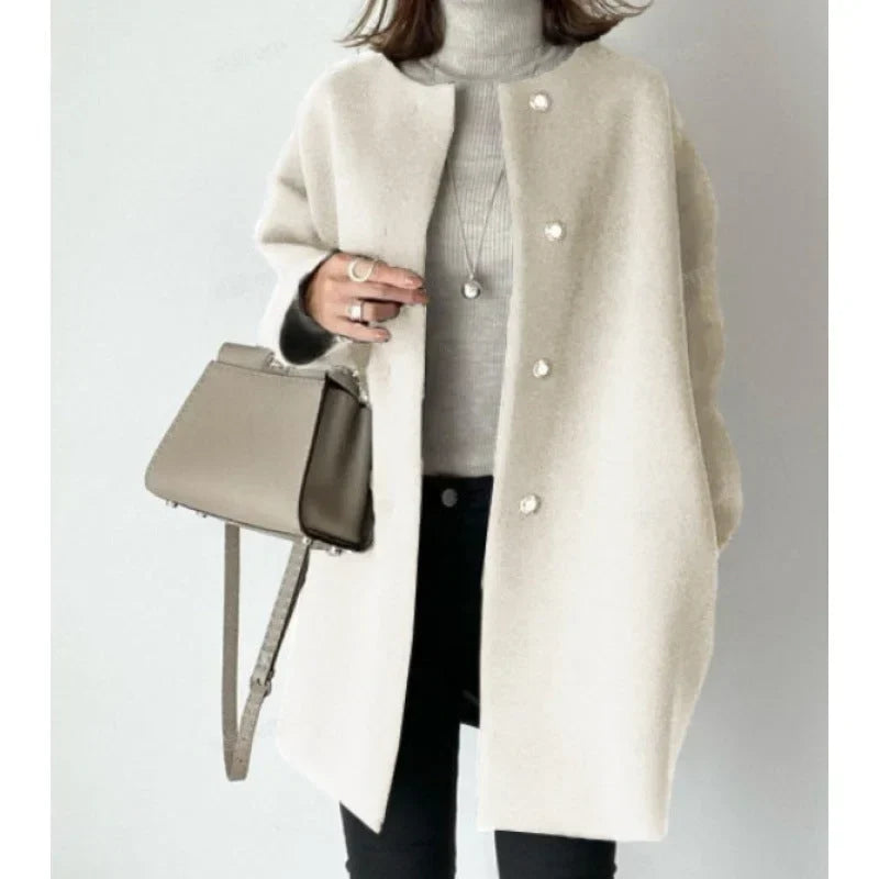 Women's chic oversized button-front coat, a classic long jacket for everyday style and warmth.