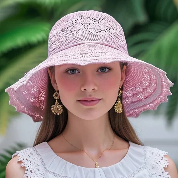 Chic women's patterned sun hat, a must-have elegant accessory for sunny days, offering stylish sun protection.