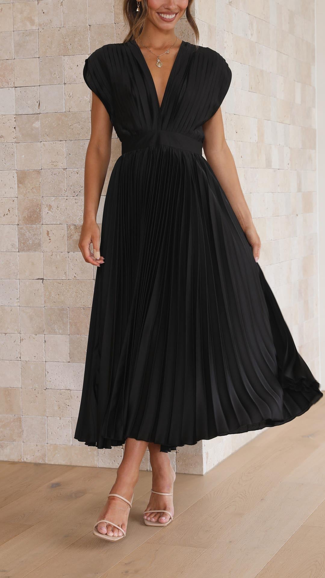Beautiful Women's Pleated Maxi Dress, deep V-neck, perfect wedding guest attire.