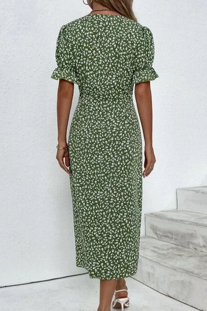 Flowy silhouette women's pleated midi dress. Elegant design, comfortable for spring & summer fashion.