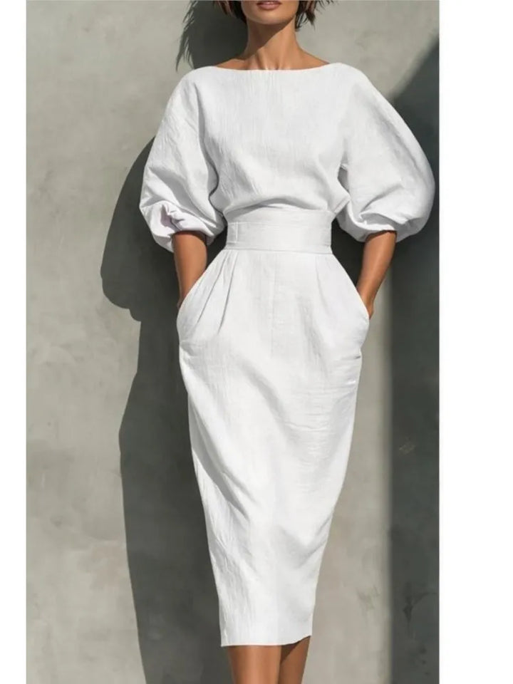 Flattering women's pleated midi dress, designed with elegant lantern sleeves & a chic cinched waist.