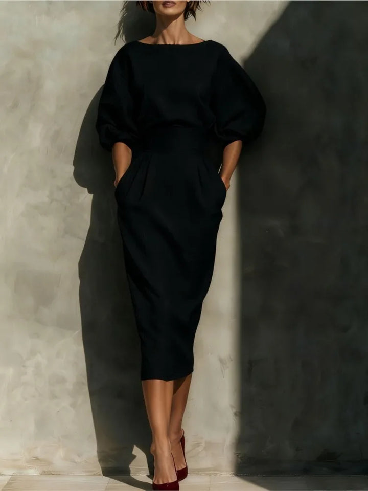 Stylish women's elegant pleated midi dress with lantern sleeves, cinched waist, great for office & occasion wear.