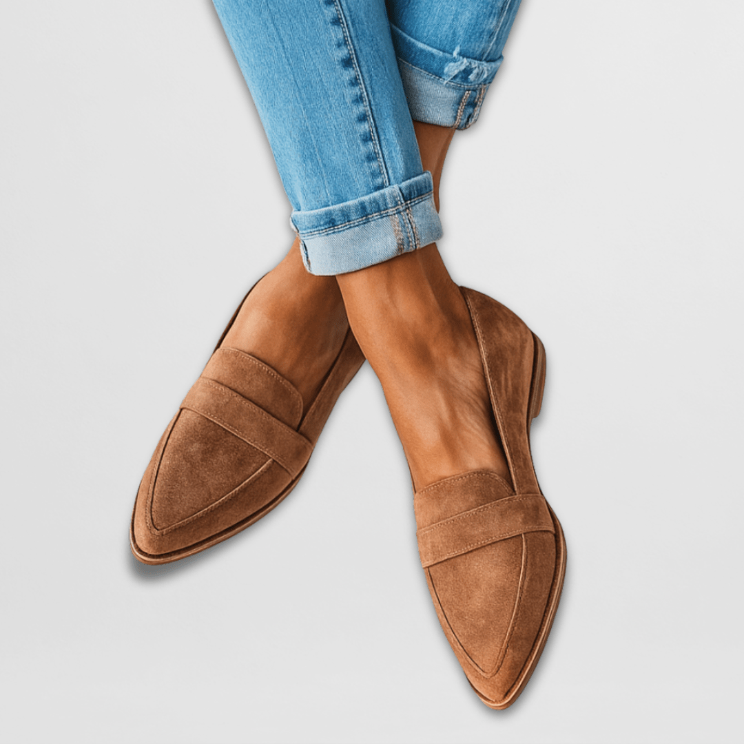Elegant women's pointed-toe flat loafers in a slip-on design, perfect for office wear or casual chic outfits.