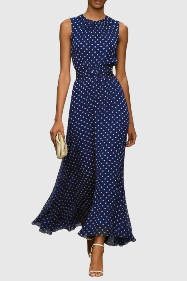 Women's elegant polka dot maxi dress with halter neck and keyhole detail, great for summer vacation.
