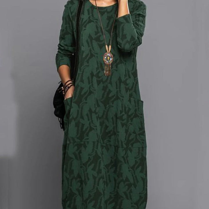 Stylish women's long-sleeve printed midi dress, versatile for everyday wear with convenient pockets.