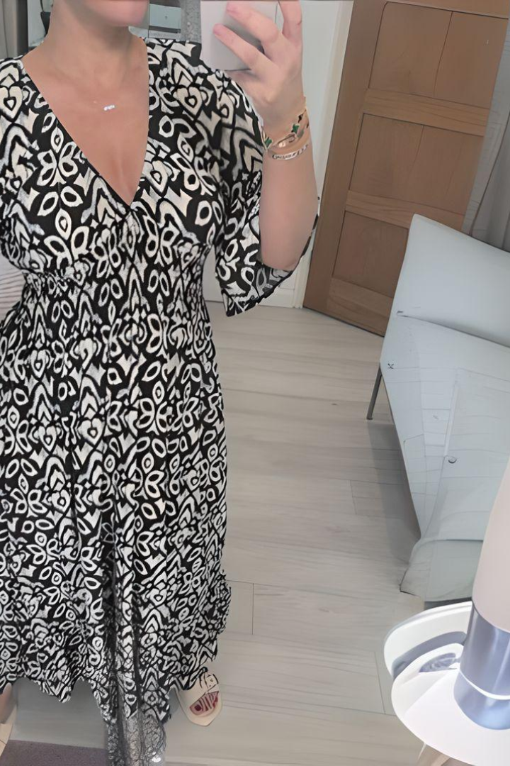 Versatile long sleeve midi dress for women, featuring a beautiful print and flattering defined waist.