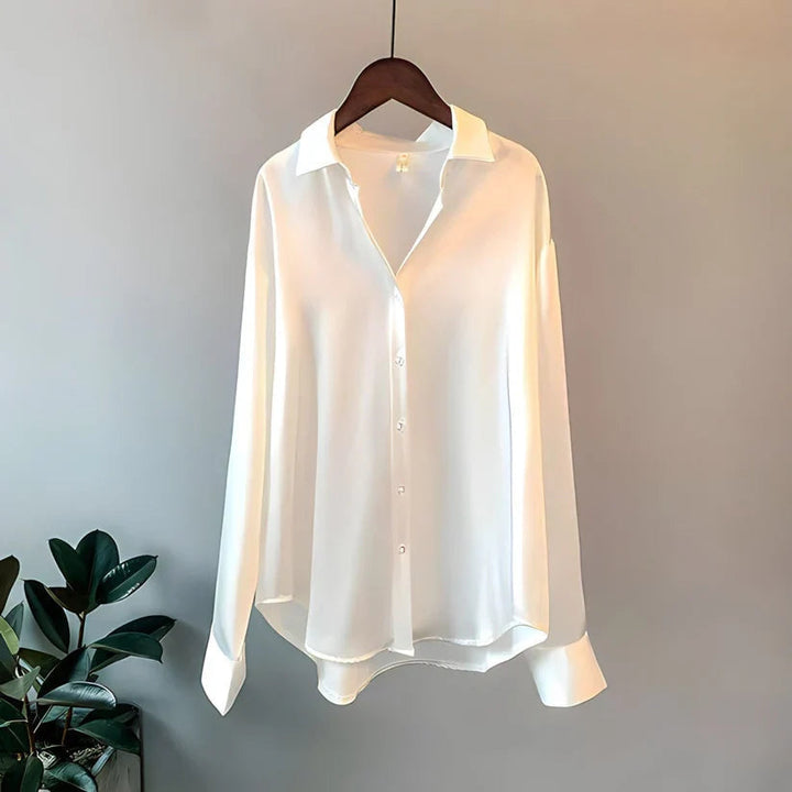 Women's elegant long sleeve button down top. Chic relaxed fit blouse, ideal for workwear & casual outfits.