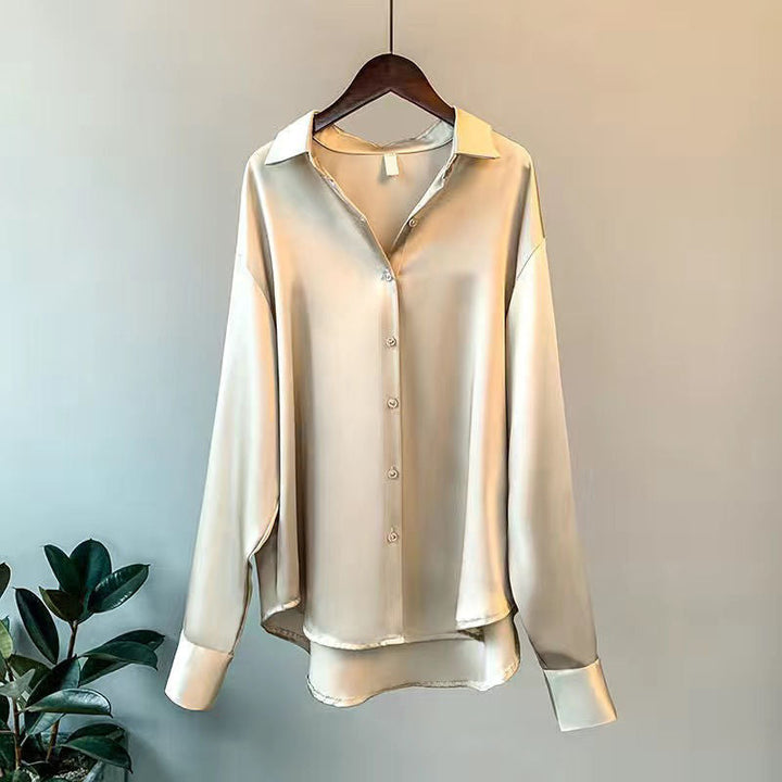Chic women's top: elegant long sleeve ruffle blouse in a relaxed fit, perfect for casual or professional outfits.