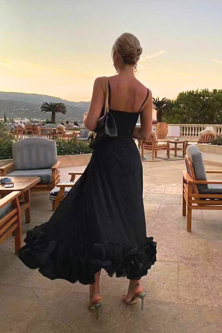 Women's elegant homecoming maxi dress with ruffle hem. Sophisticated wedding guest & party dress.