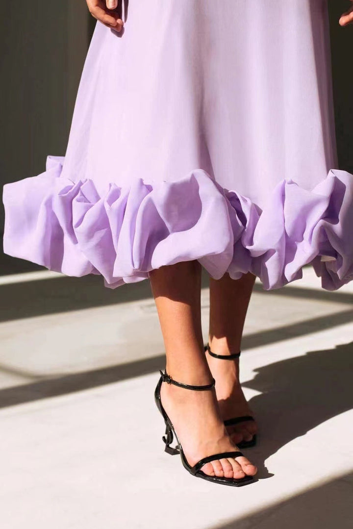 Graceful women's ruffle hem maxi dress, an elegant sleeveless evening gown for special events.