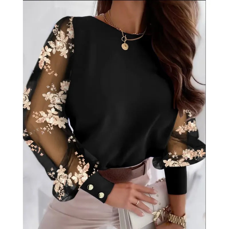 Elegant women's sheer sleeve blouse with chic floral appliqués, perfect for party wear or formal events.