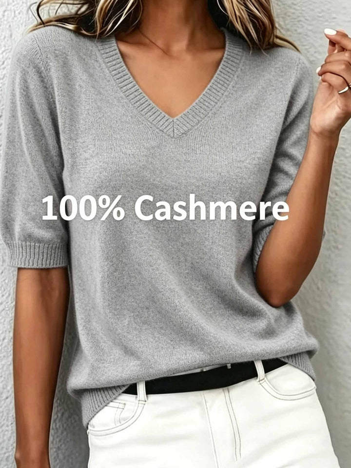 Smart casual women's short-sleeve V-neck sweater, ideal for office elegance or everyday wear.