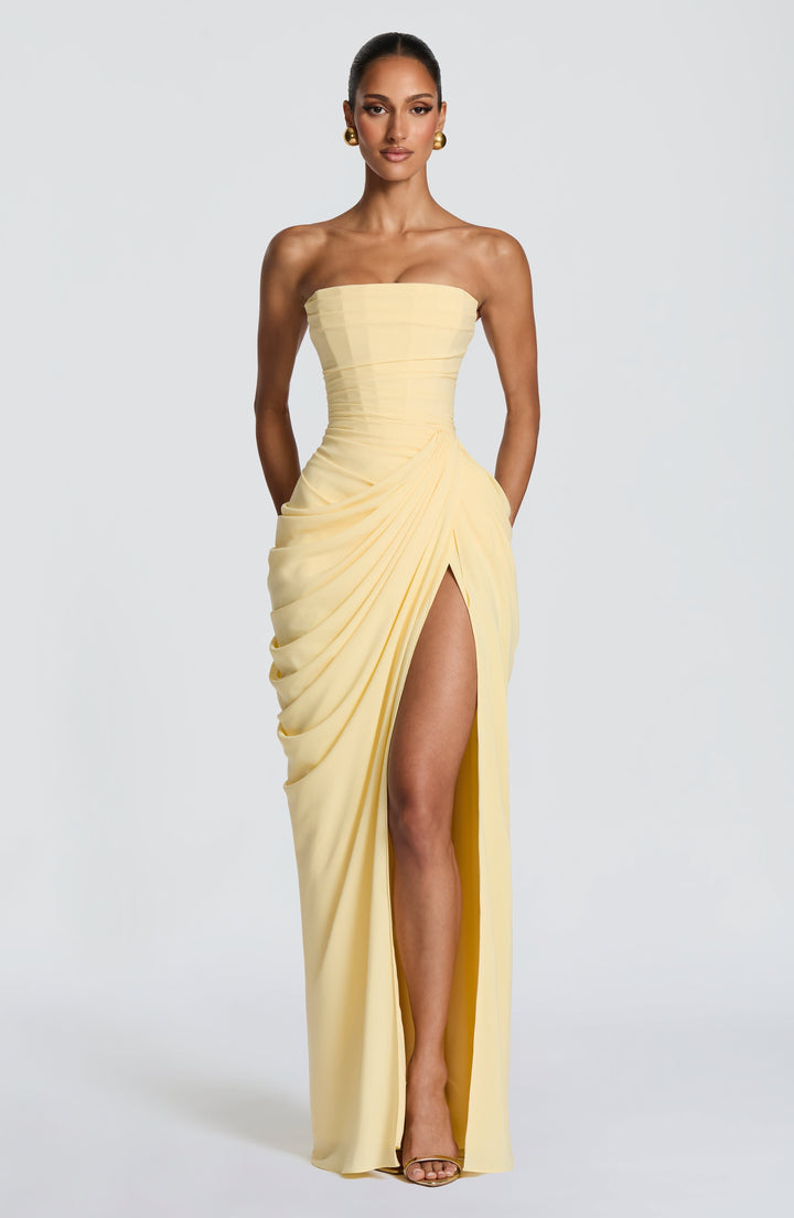 Elegant women's strapless corset maxi dress with high slit & lace-up back, perfect for formal evening events.