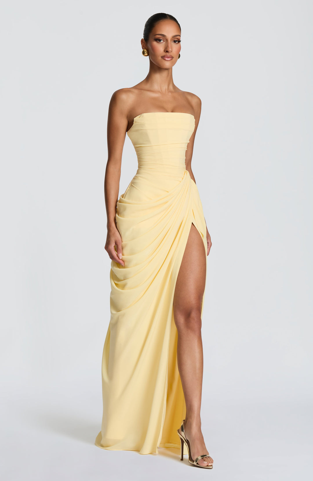 Chic women's strapless column dress, a formal corset maxi with high slit, ideal for elegant evening parties.