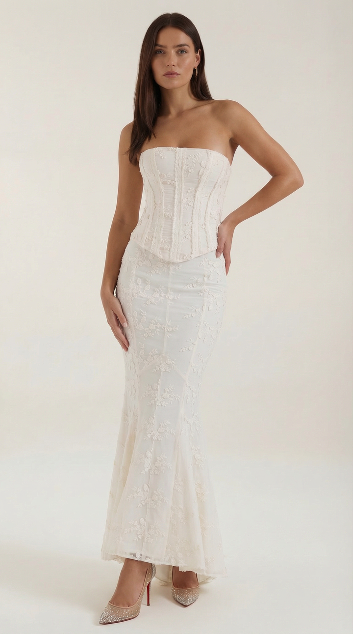 Elegant women's strapless floral corset maxi dress for formal events. Ideal as a wedding guest or evening gown.