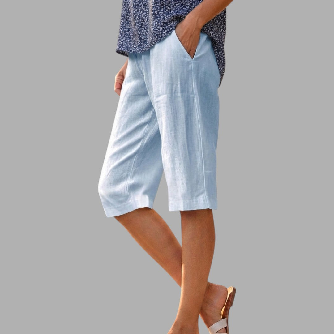 Classic women's knee-length tailored shorts, ideal for elegant smart casual summer fashion and apparel.