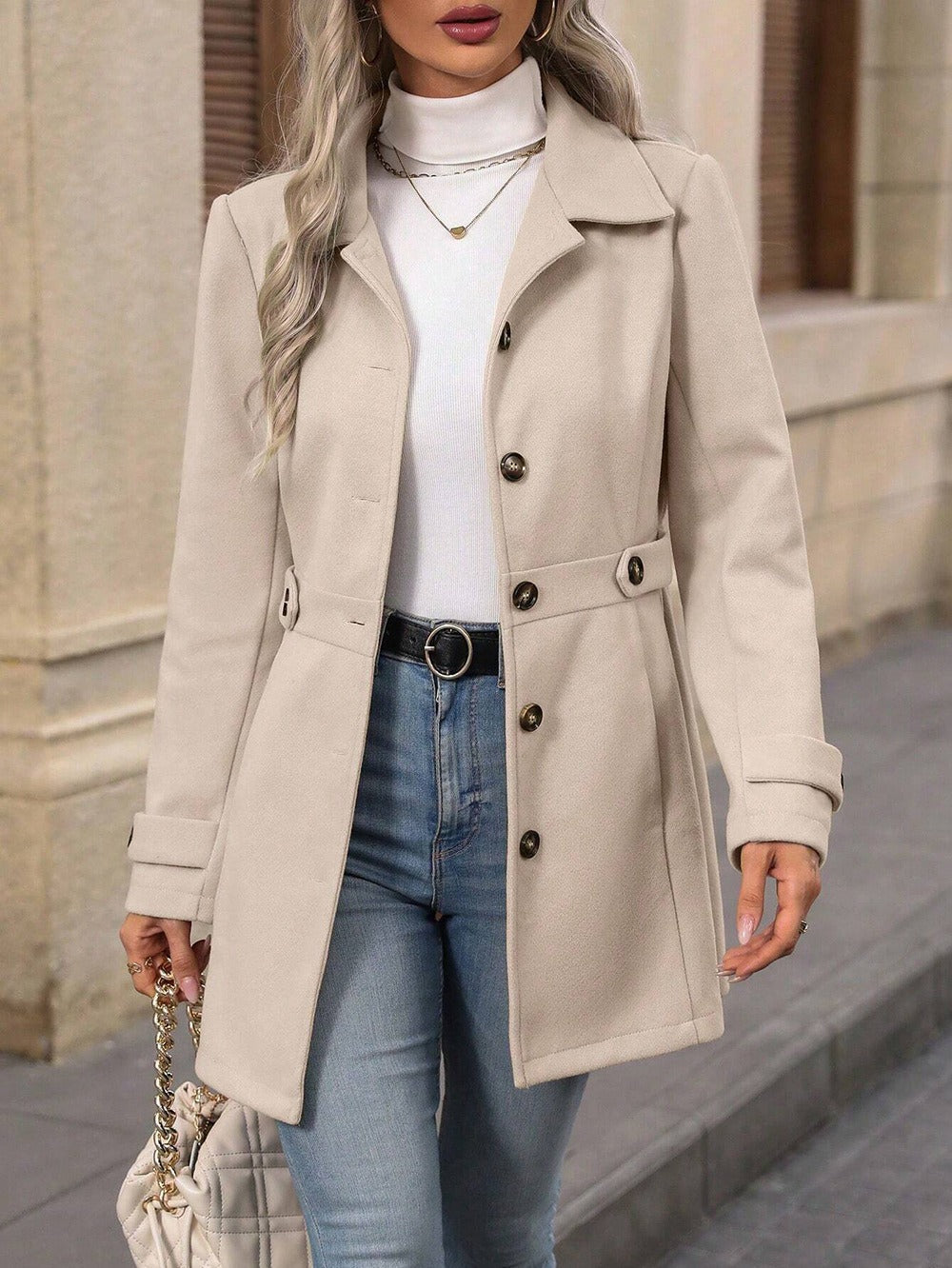 Women's elegant fall trench coat, a long jacket with an adjustable belt for sophisticated outerwear.