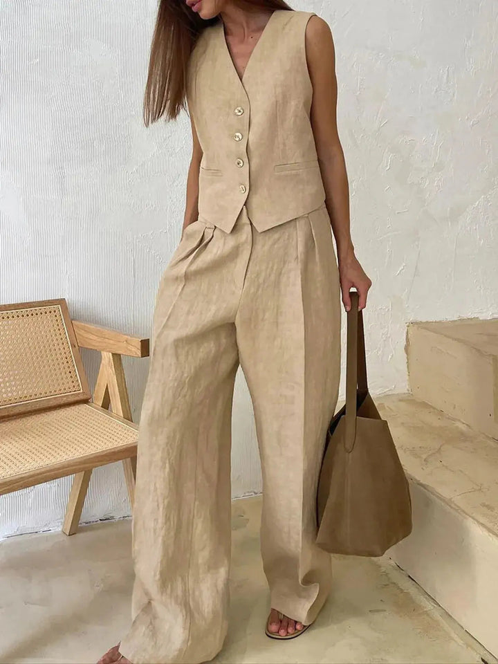 Versatile women's waistcoat & wide-leg trousers set. Perfect for elegant, smart casual, or chic spring/summer looks.
