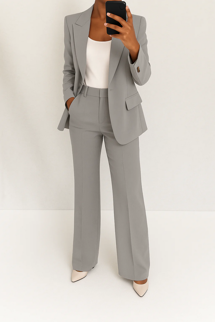 Professional women's business suit: coordinated blazer and wide-leg pant set, ideal for polished office attire.