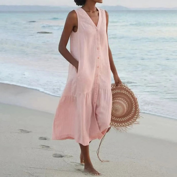 Flowy button-front midi sundress for women, featuring a V-neck, ideal for summer fashion, beach, or day wear.