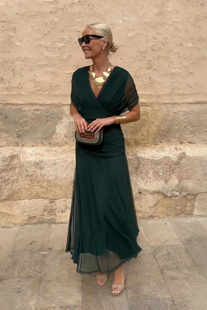 Elegant women's V-neck maxi dress with flutter sleeves. Perfect for evening, party, or formal wear.