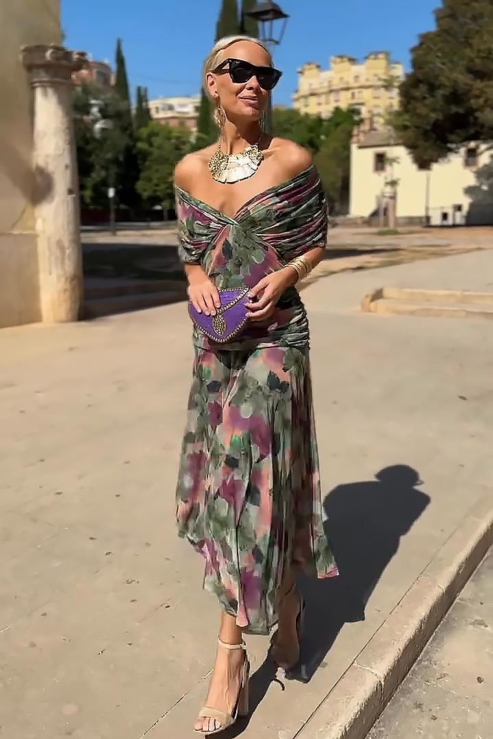 Chic women's summer maxi dress with a V-neckline & elegant flutter sleeves. Perfect for spring fashion.