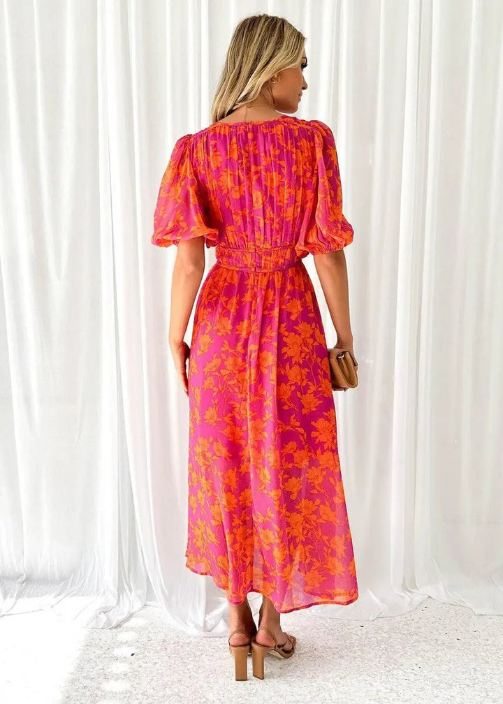 Comfortable V-neck puff sleeve midi dress for women. Versatile for casual or elegant summer wear.