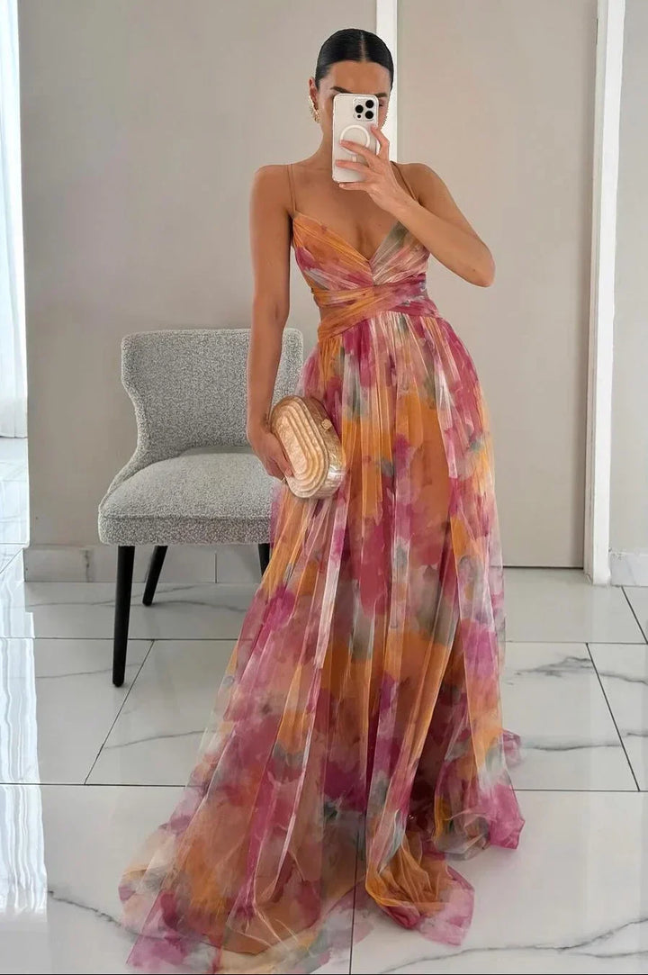 Elegant women's watercolor floral maxi dress with twist front, perfect for wedding guests or summer parties.