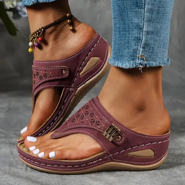 Comfortable women's wedge sandals featuring adjustable ankle straps for a secure, custom fit. Ideal for all-day wear.