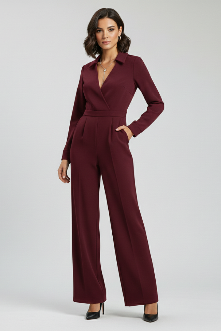 Professional women's elegant jumpsuit, featuring a button-front, shirt collar, and stylish wide leg pants.