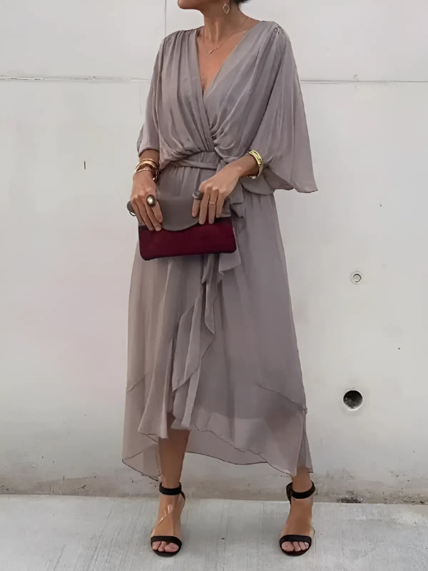 Beautiful women's elegant wrap midi dress, featuring a flattering fit and versatile style for any occasion.