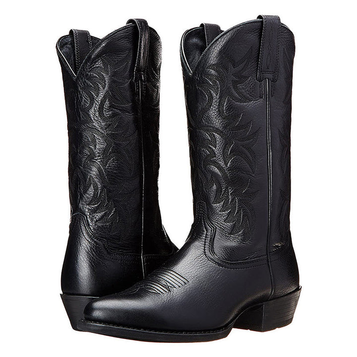 Elegante Cowboy-Stiefel aus hochwertigem Leder mit spitzen Zehenkappen, markanten Nähten; ideal für verschiedene Anlässe.