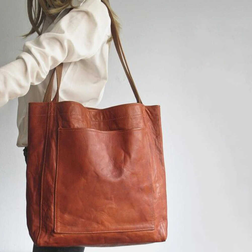 Elegante Damen Lederhandtasche, stilvoll und vielseitig, mit geräumigem Innenraum, ideal für Büro und Freizeit.